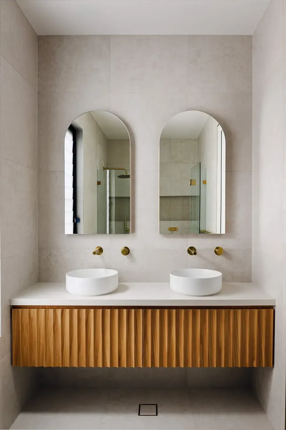 obrien-duplex-bulli-ensuite-double-vanity-fluted-timber-arched-mirrors-light-and-lines.webp