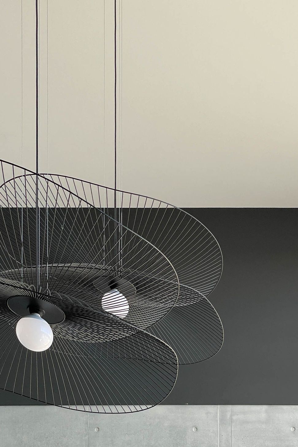 M Residence - Dining Room. Sculptural pendant lights above the dining table.