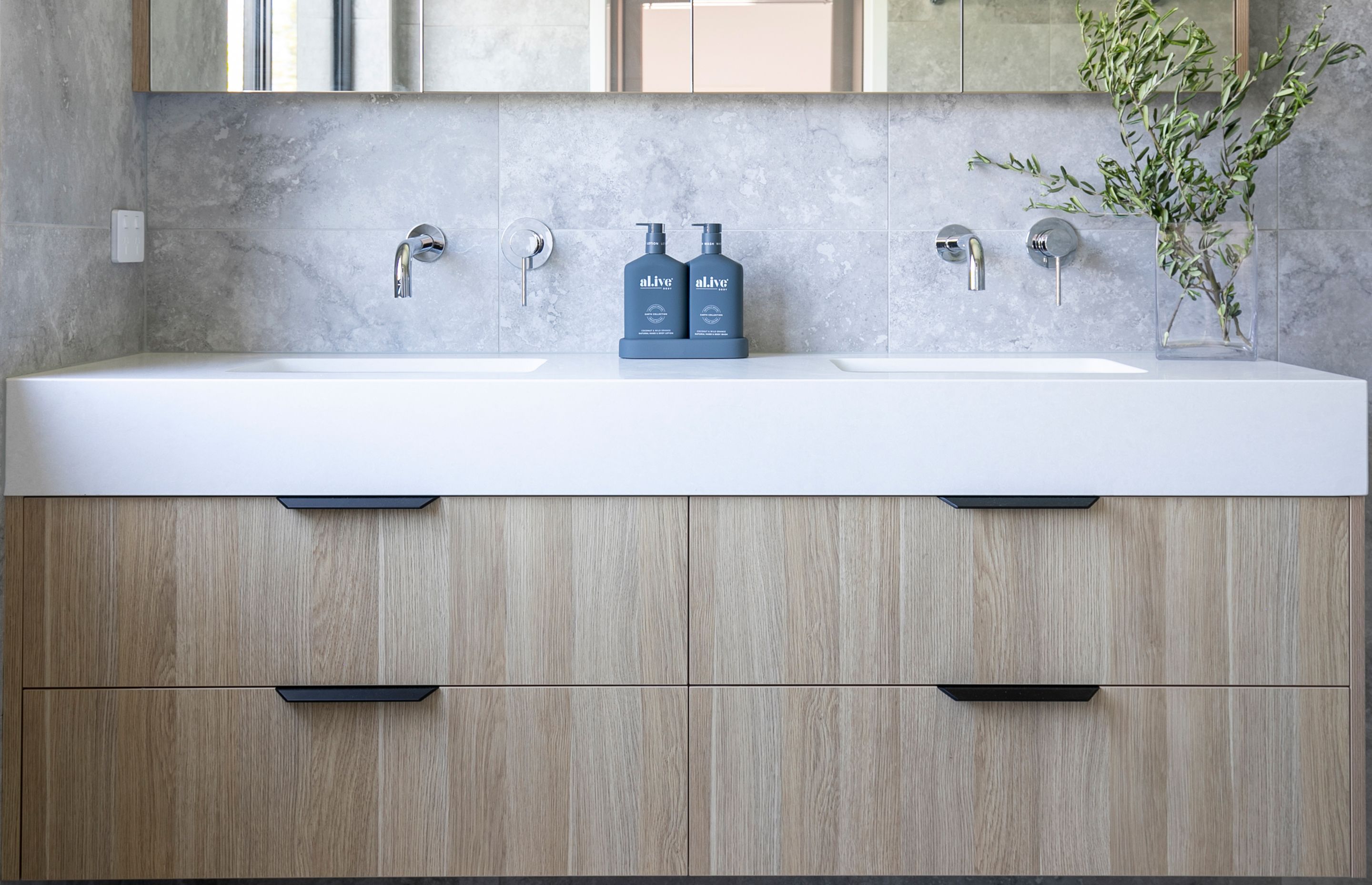 Photography: Rachael Lane | Featured on the above double vanity is our Polished Chrome Round Curved Wall Spout (SKU: MS05-C) and Round Wall Mixer (MW03-C).