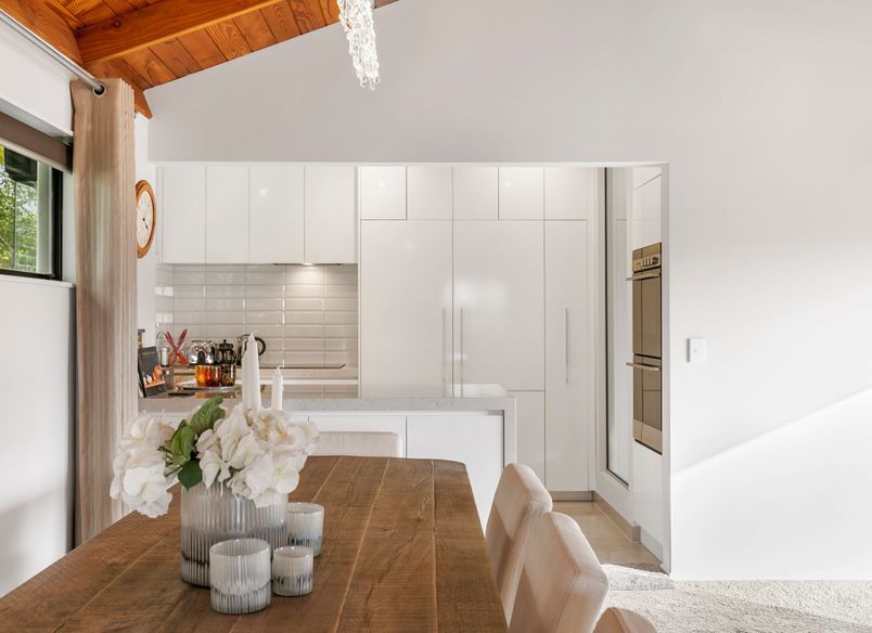 “From Stairs to Storage: How Recessing a Wall Oven can Transform the Kitchen”