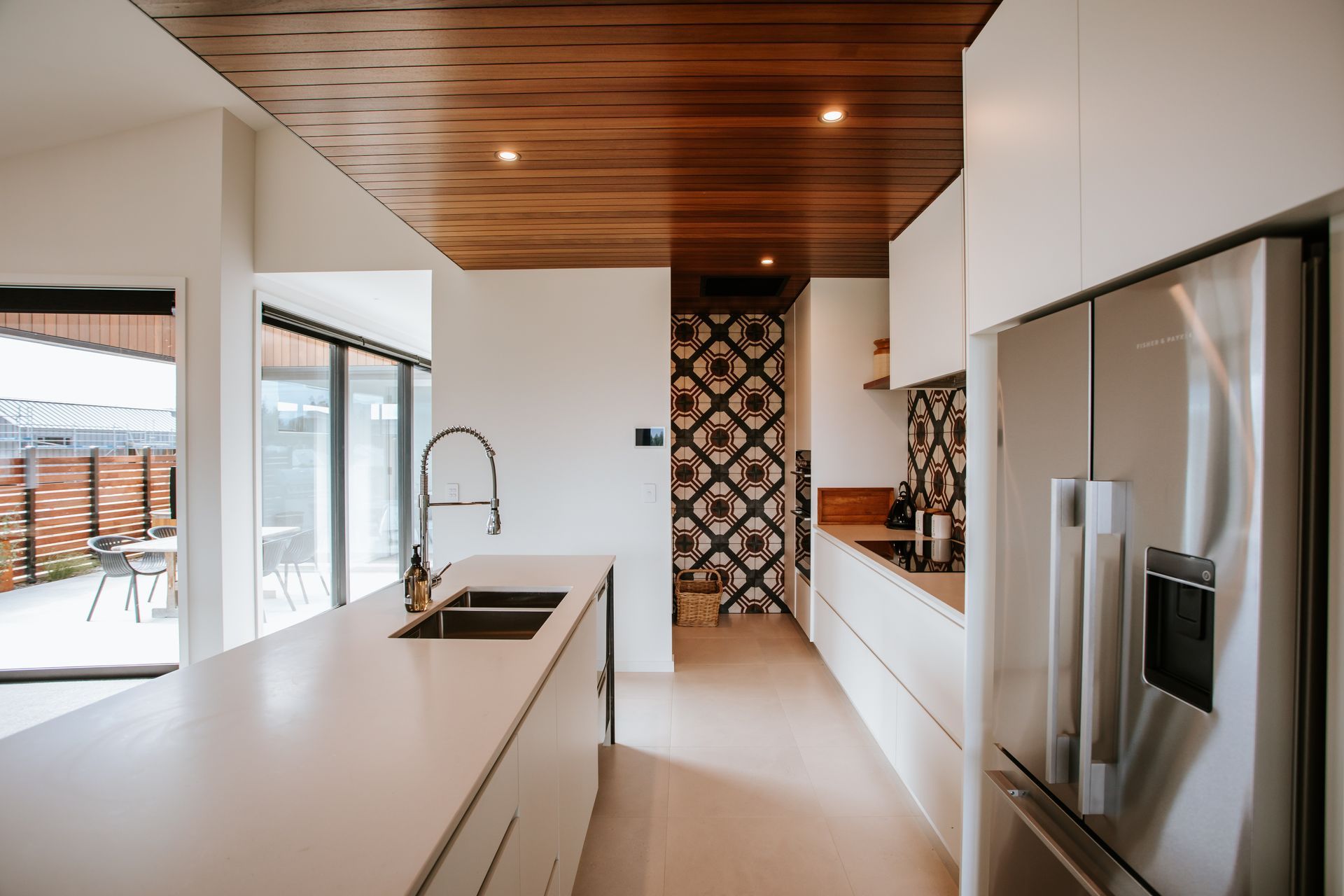 A scullery tucked to one side of the kitchen means clutter can be kept out of sight.