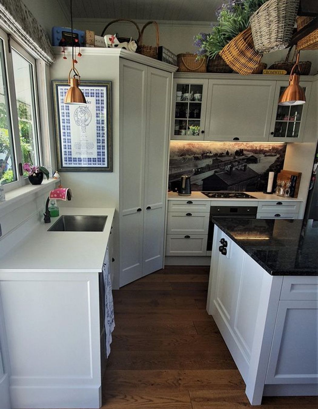 Artwork, lighting and the custom splash back add personal touches