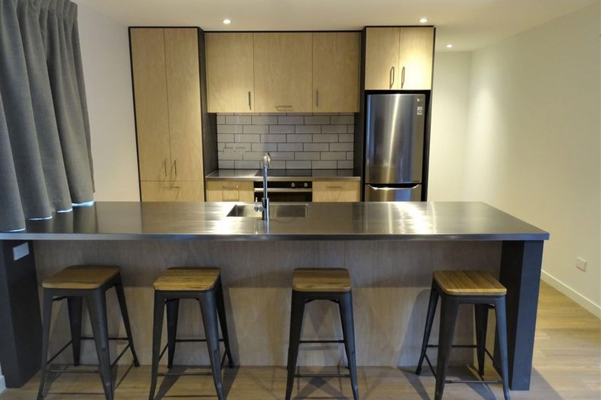 Breakfast bar area and kitchen overview