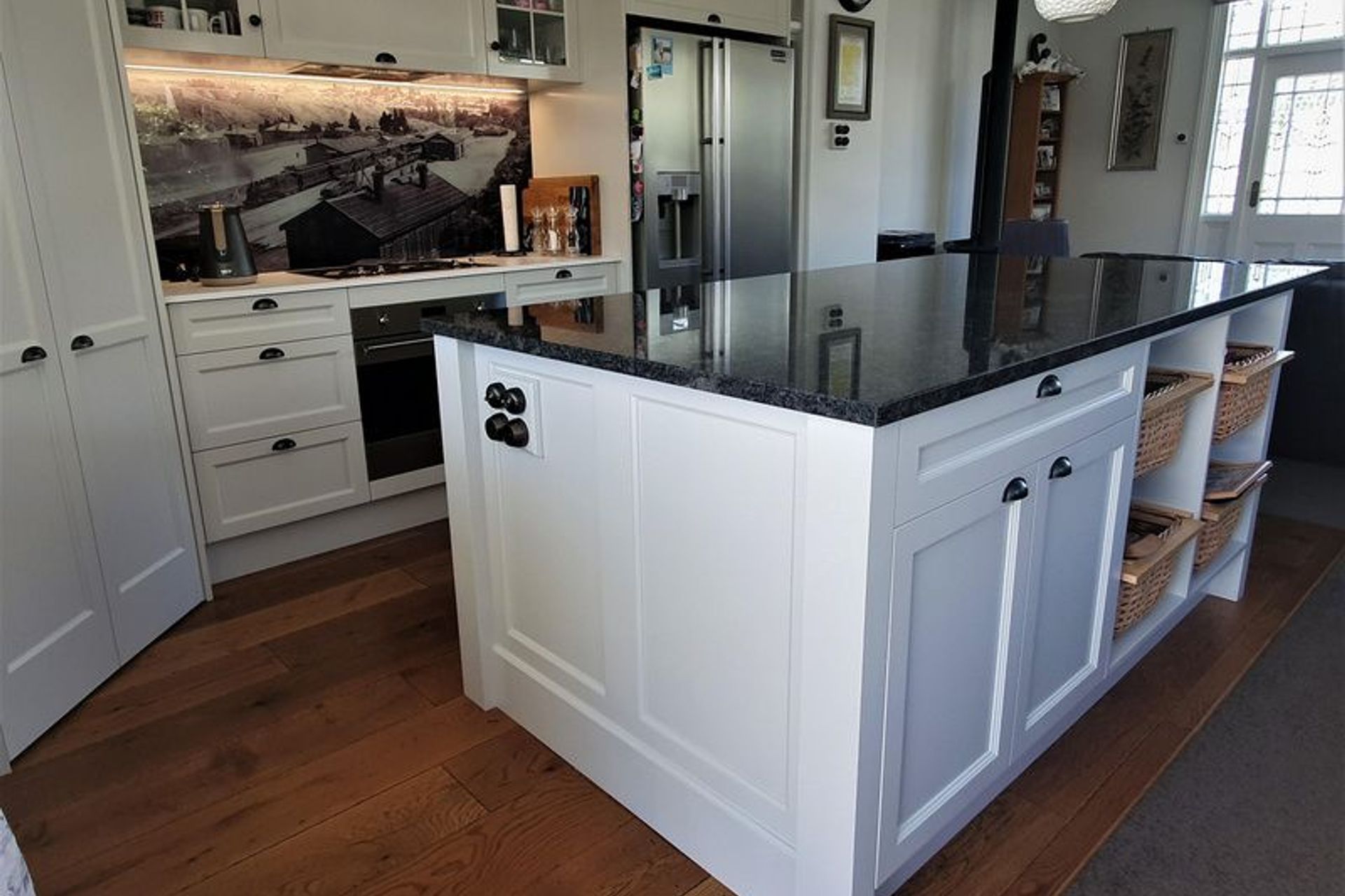 Lots of storage space in this Cape Cod style kitchen in Dunedin by Ron Kirk Joinery