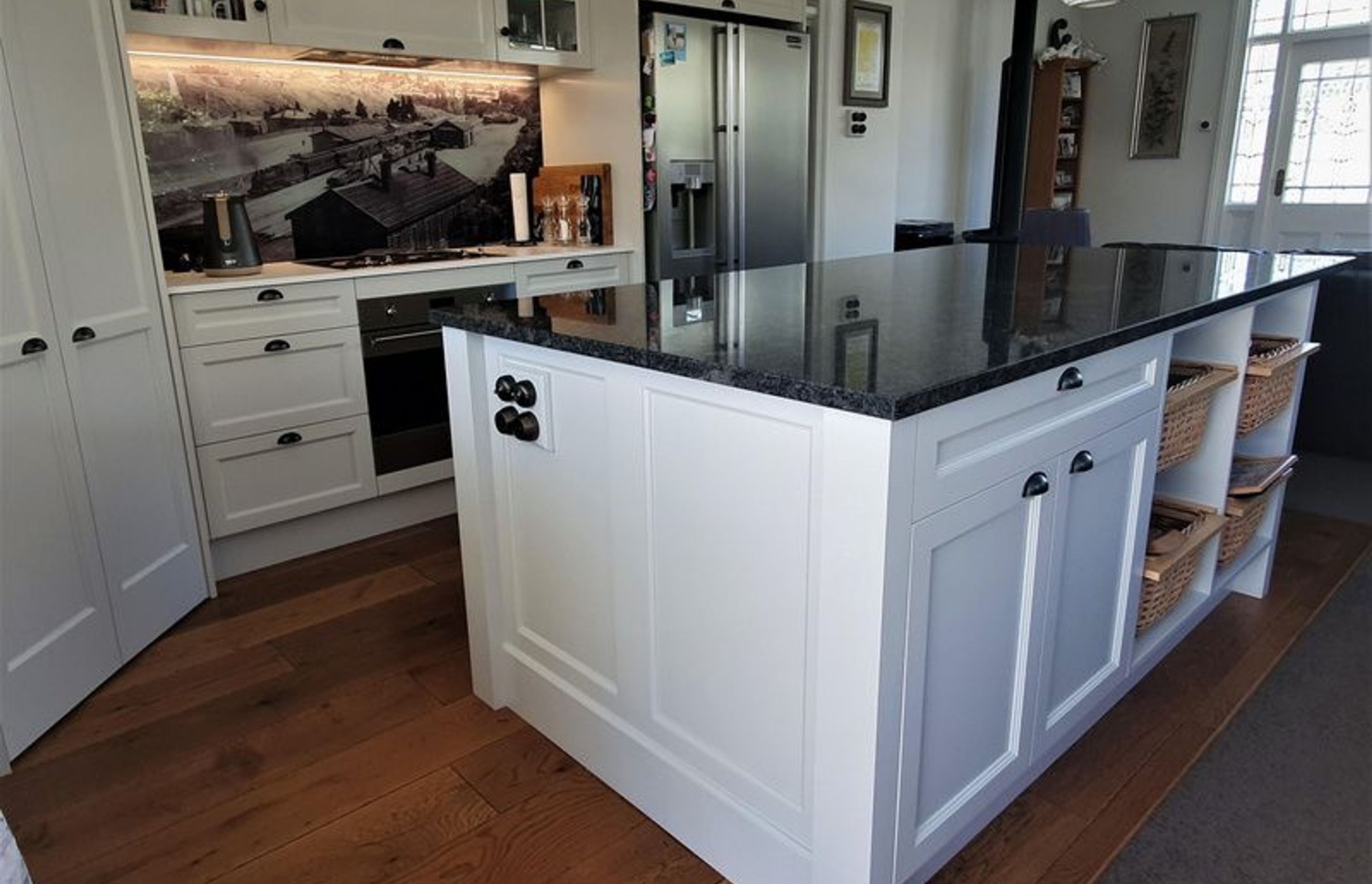 Lots of storage space in this Cape Cod style kitchen in Dunedin by Ron Kirk Joinery