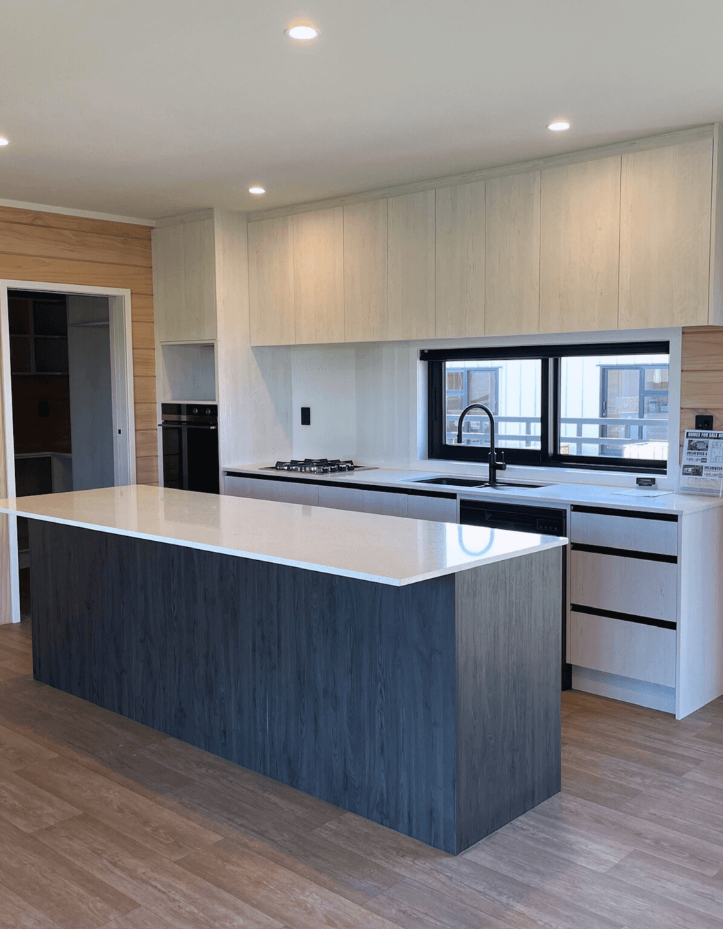 Streamline Kitchen Complete with a Spacious Butler's Pantry