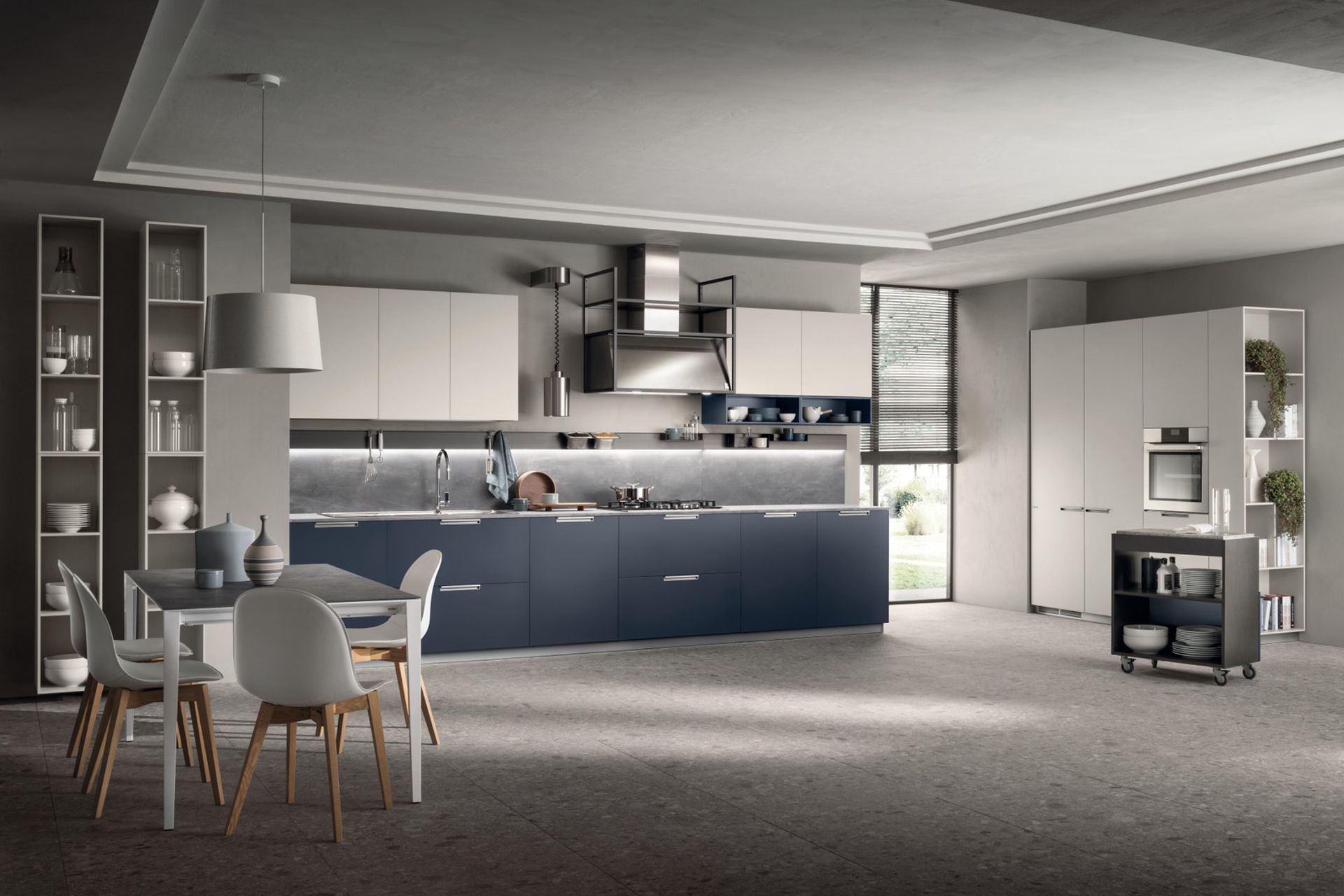 Moon Blue matt lacquered base units and light grey matt lacquered wall units and cabinets, for an extremely welcoming combined effect. MIA by Carlo Cracco