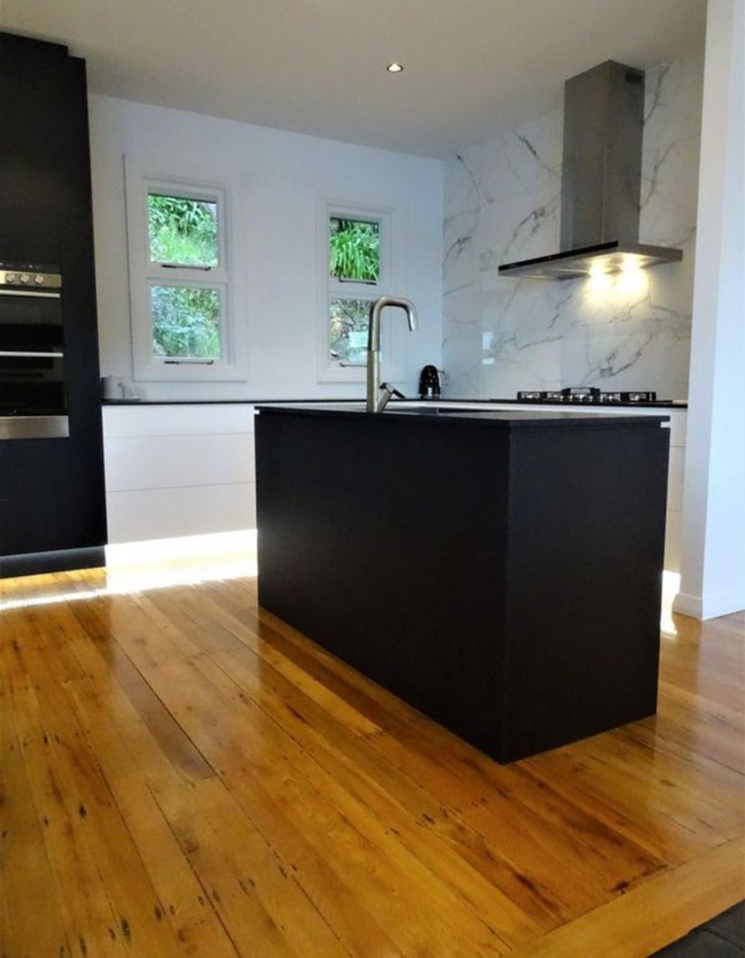 Statement black kitchen island joinery
