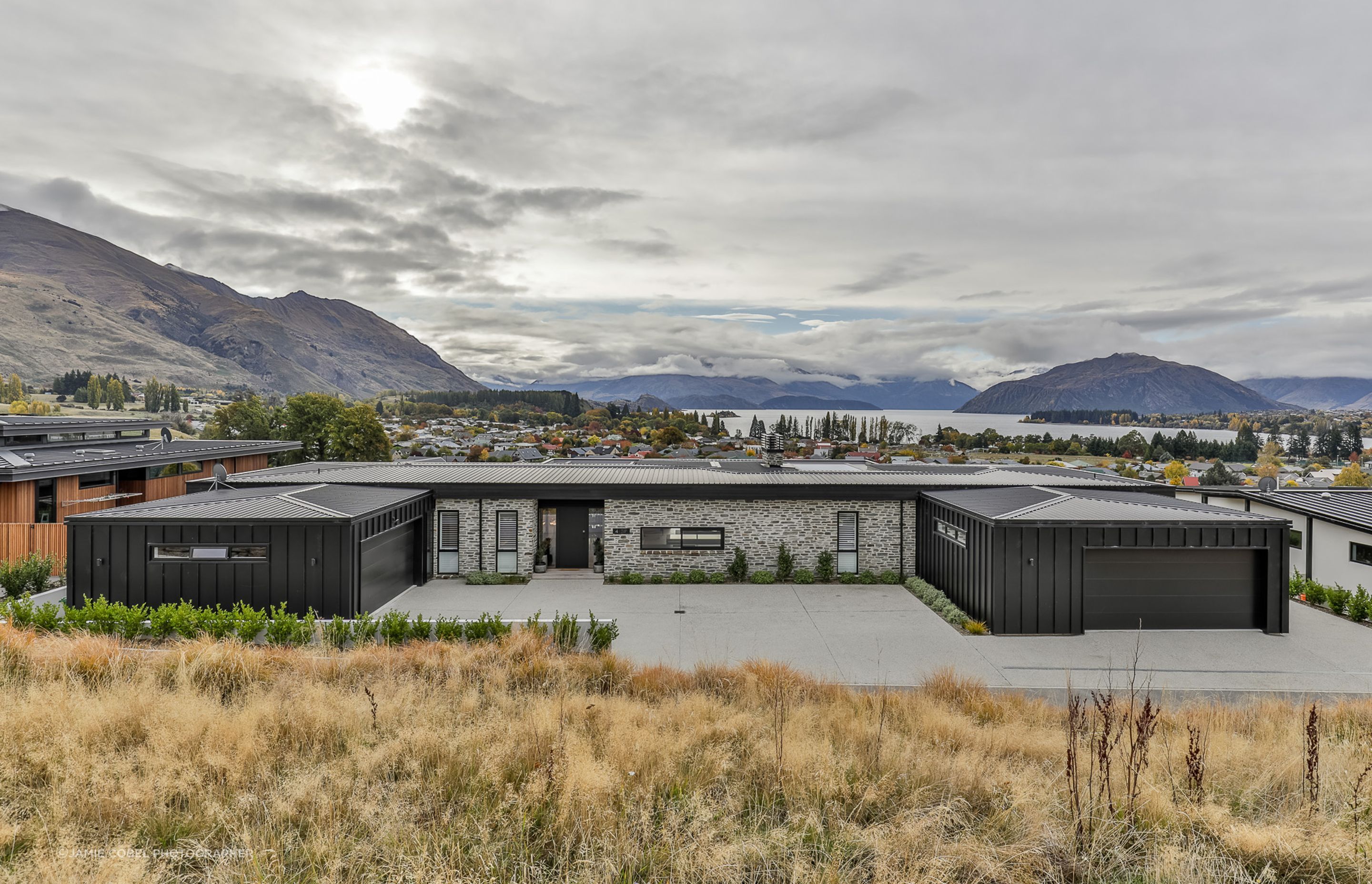 Dual garaging and ample off lane parking. Landscaping- by Tim at The Landscaper Wanaka.