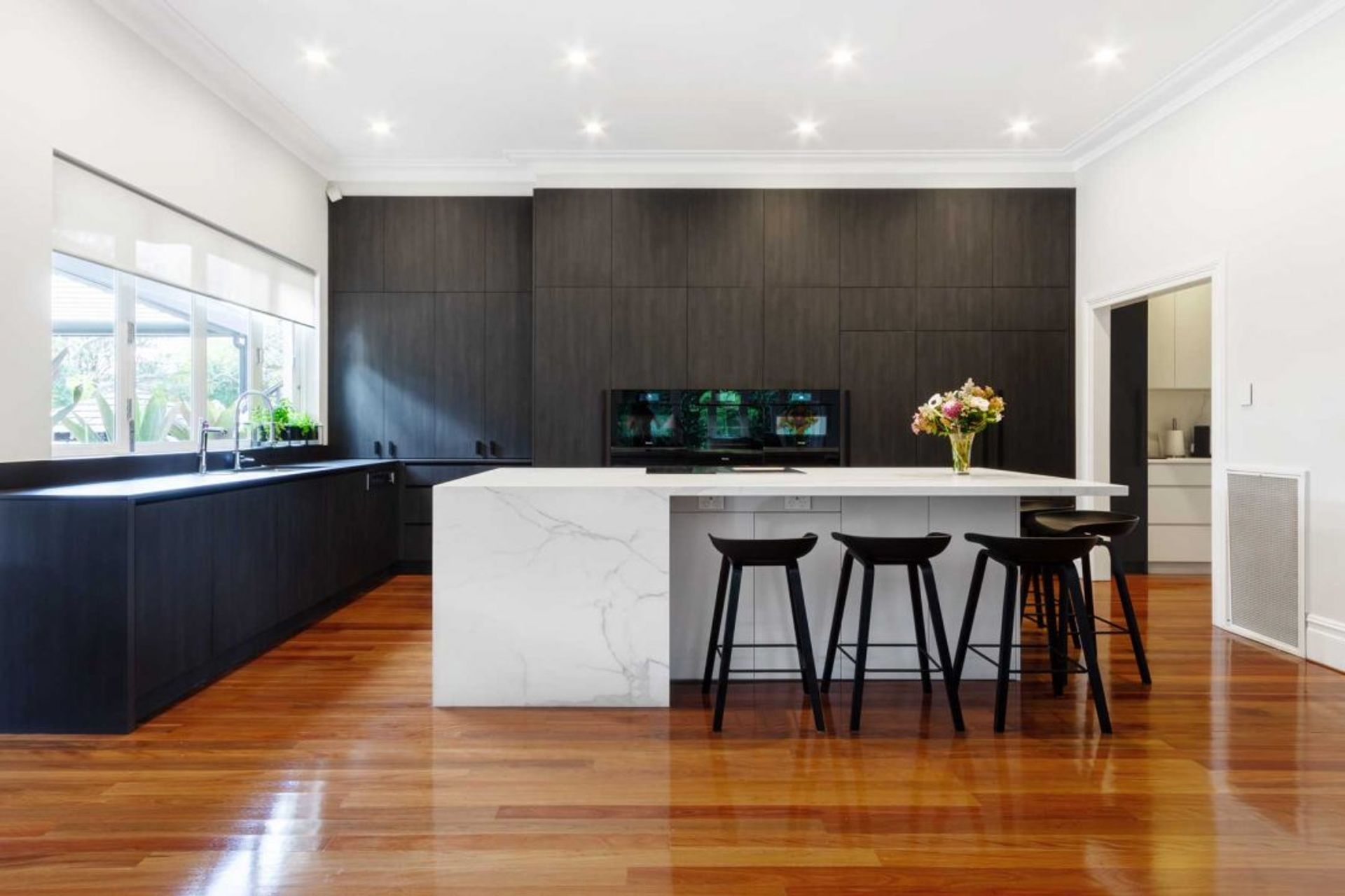premier-kitchen-design-sydney-neolith-dekton-benchtop-splashback-dark-timber-white-cabinets-02-1084x723.jpg