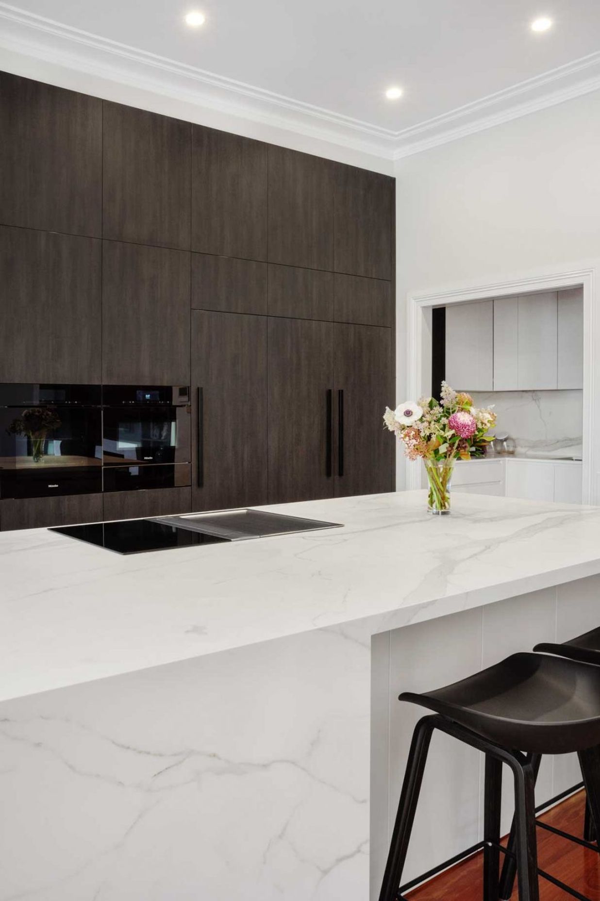 premier-kitchen-design-sydney-neolith-dekton-benchtop-splashback-dark-timber-white-cabinets-03-1084x1626.jpg