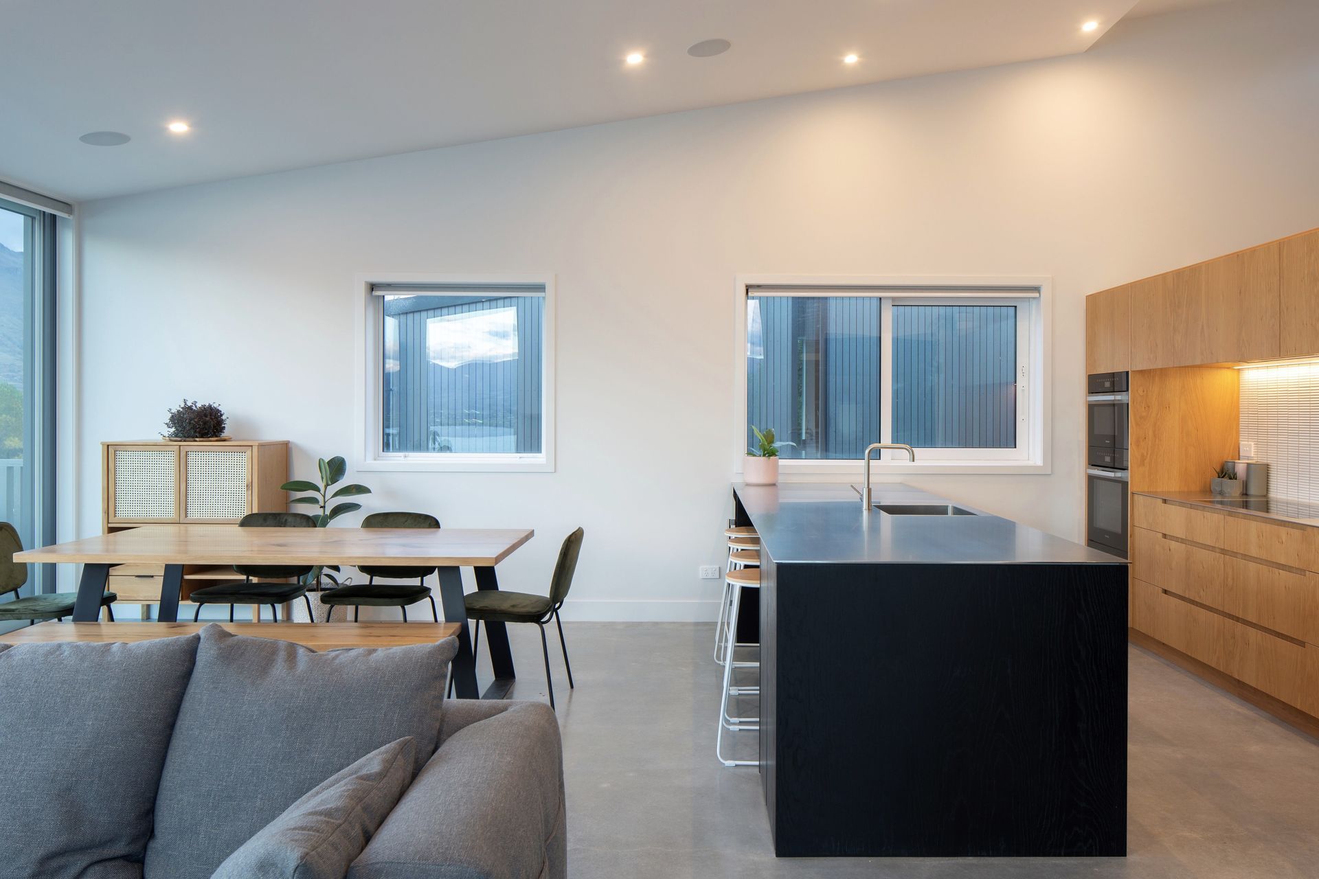 Kitchen and Dining rooms with high level sloped ceilings