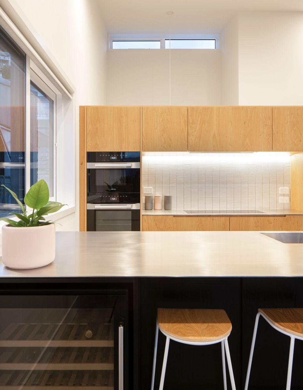 Bespoke kitchen joinery with high level glazing at the rear