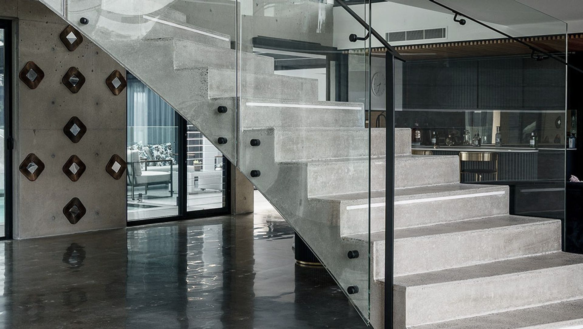 The Esplanade – Twin Bent Glass Curved Staircase banner