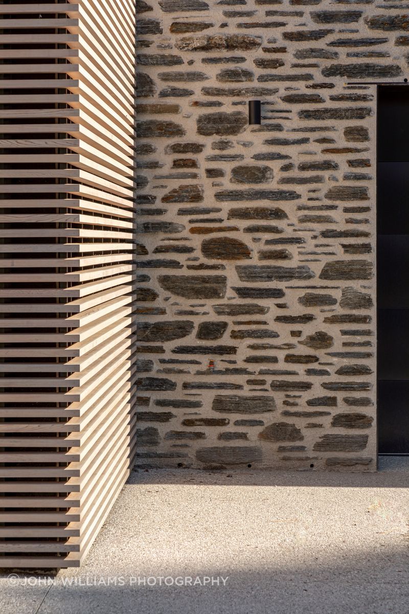 055-Ben-Hudson-Architects-Lake-House-stone-timber-detail.jpg