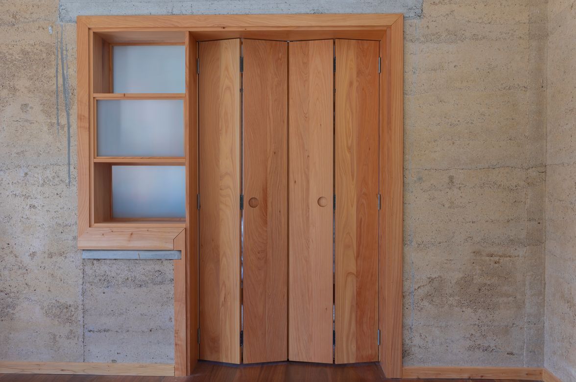 Bi-fold doors with book shelf