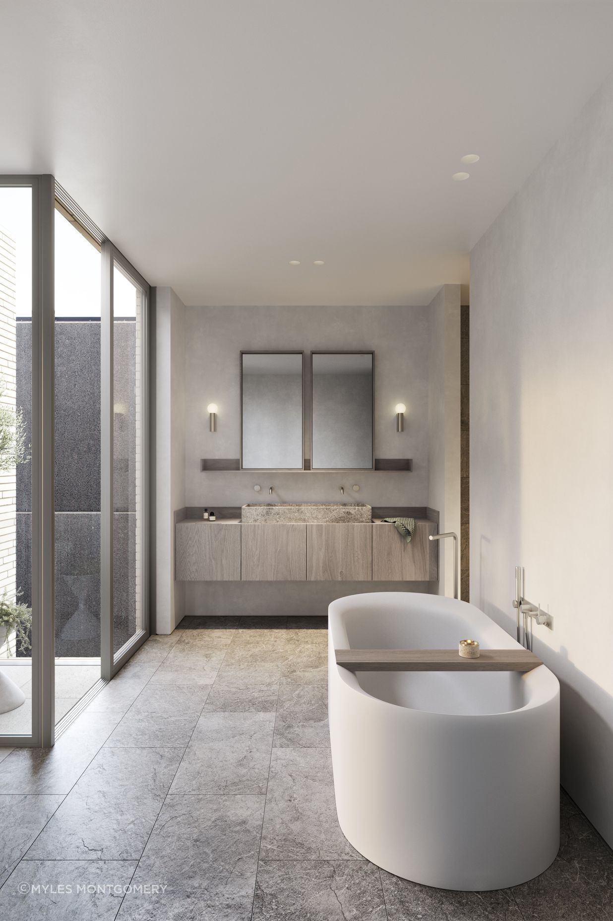 Tumbled marble tiles and carved stone basins imbue bathrooms with an elegant tactility.