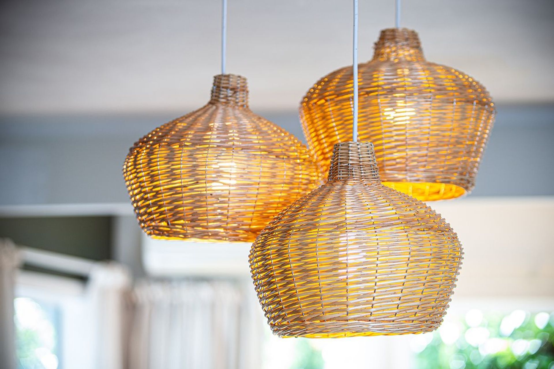 Simple basket-weave light shades and to the crafted feel of this home.