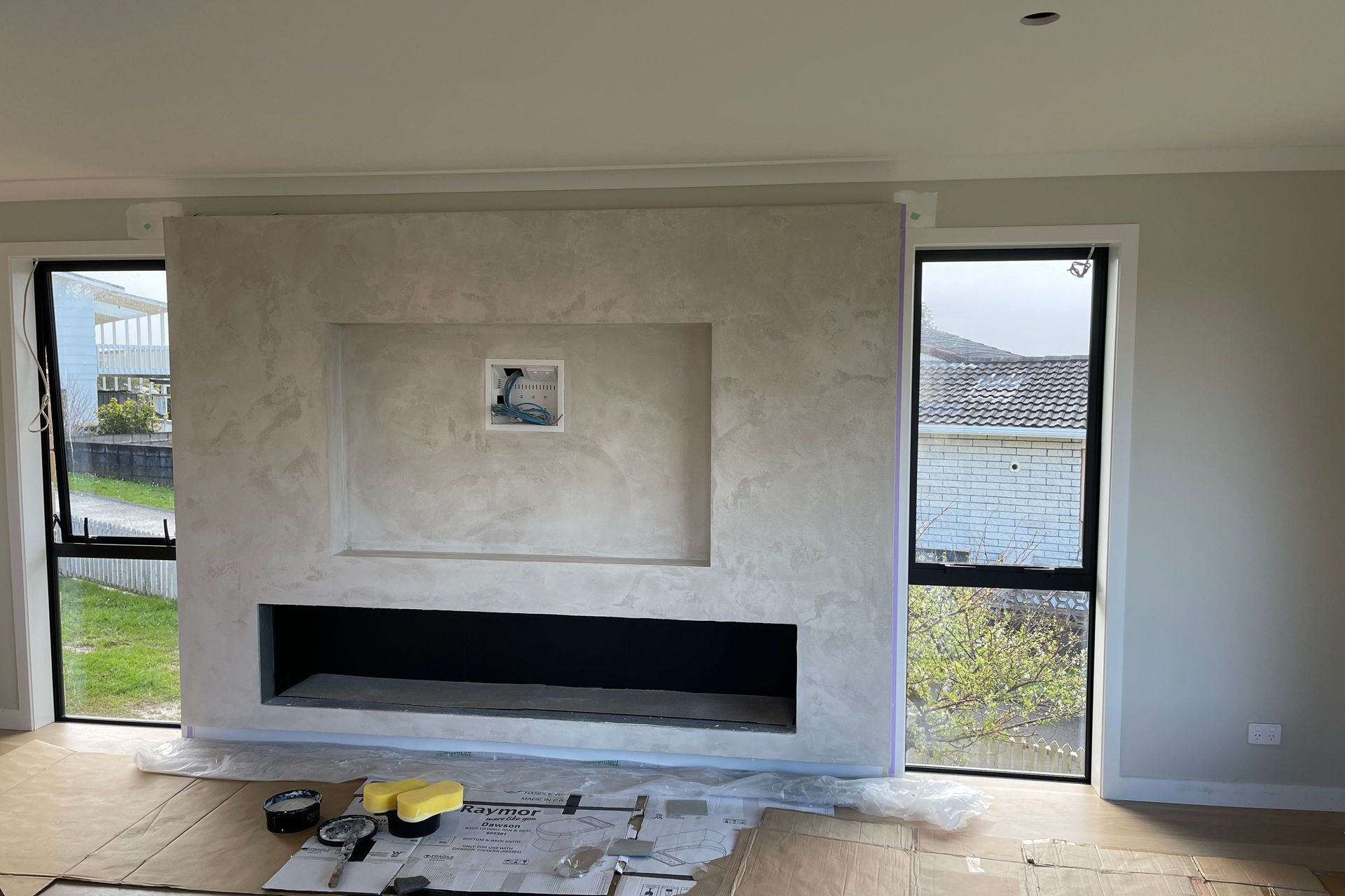 Resistone microcement fireplace