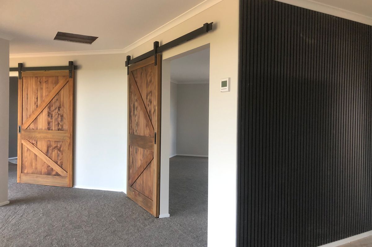 Beautiful Bespoke Macrocarpa Barn Doors