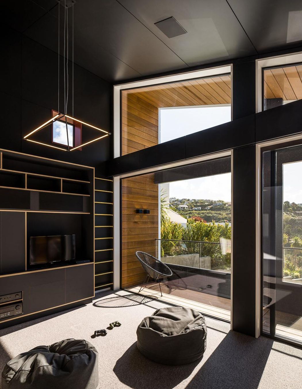 Discrete electrical work was concealed in a cavity behind the media room cabinetry.