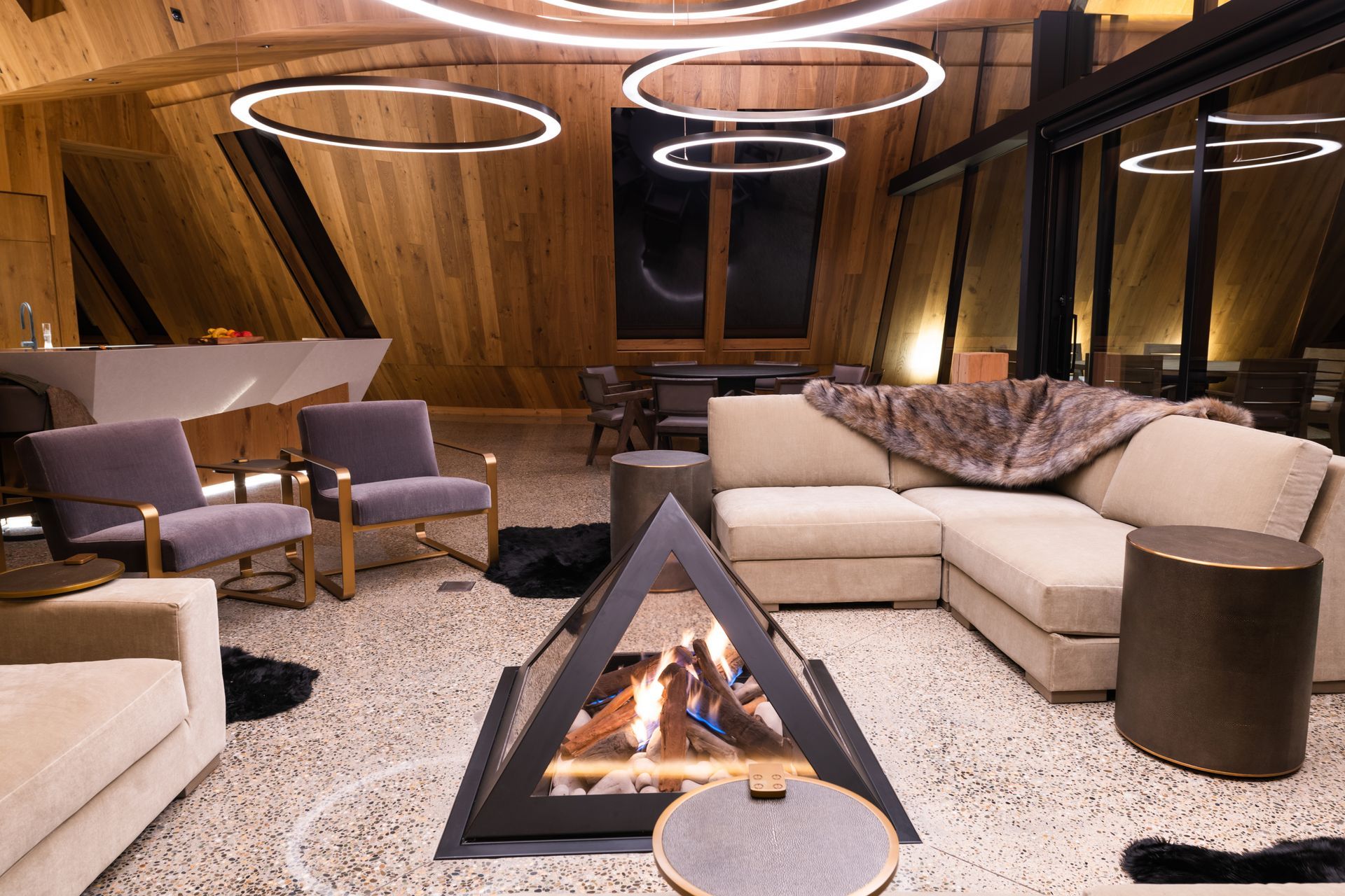 The pyramidical fireplace was specially designed by The Fire Dept for the lodge.