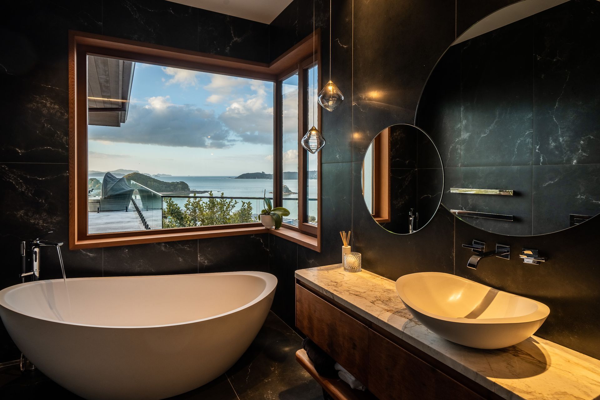 A bathroom with a view. The bath tapware is by Kohler.