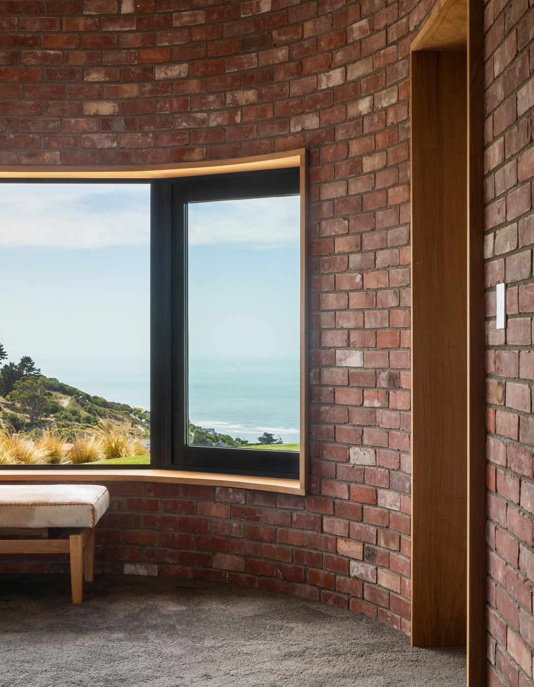 The internal facings of the pods are wrapped in recycled brick, complete with the traces of creeping vines.