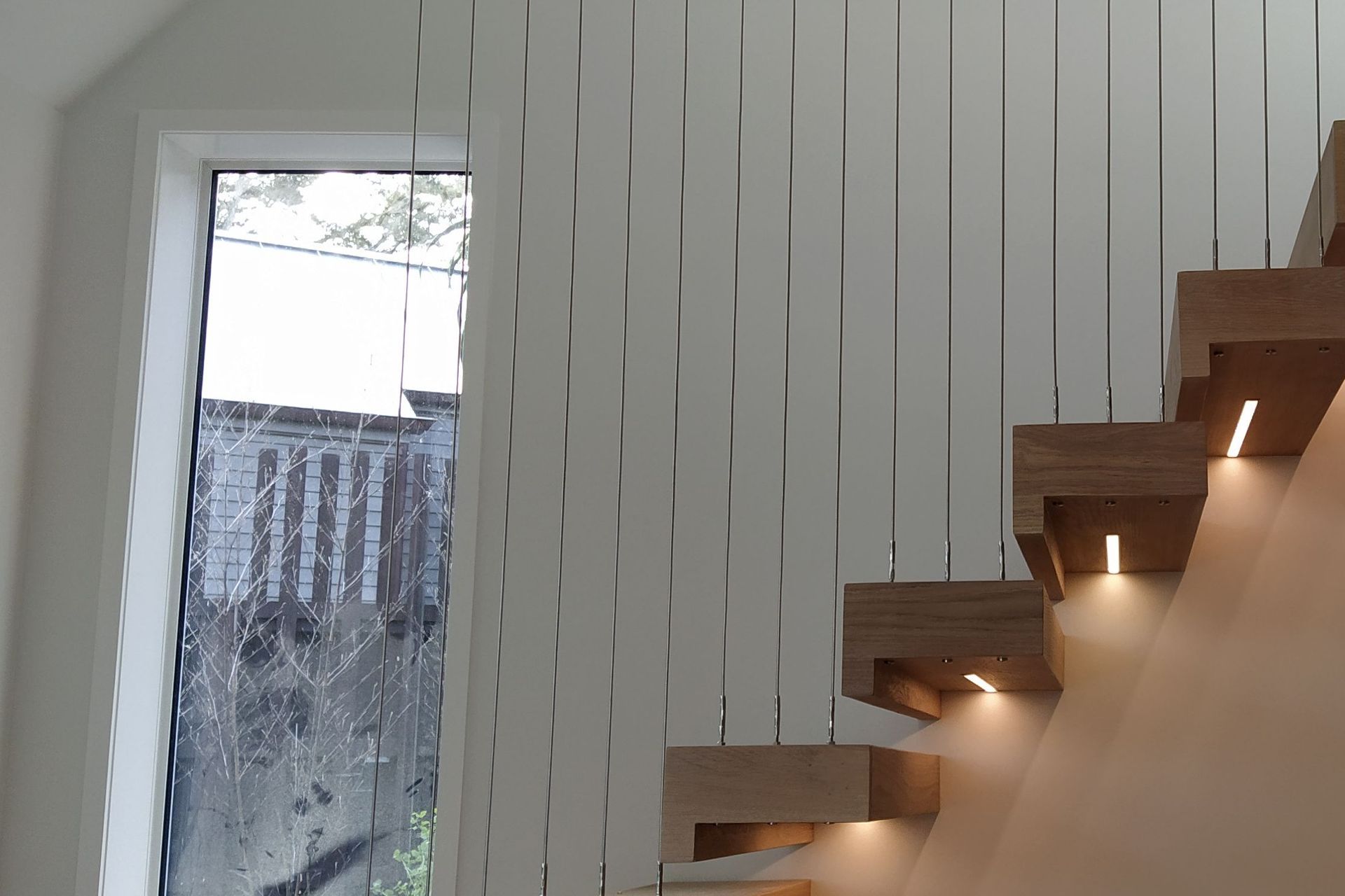 Floating stairs - residential wire balustrade infil