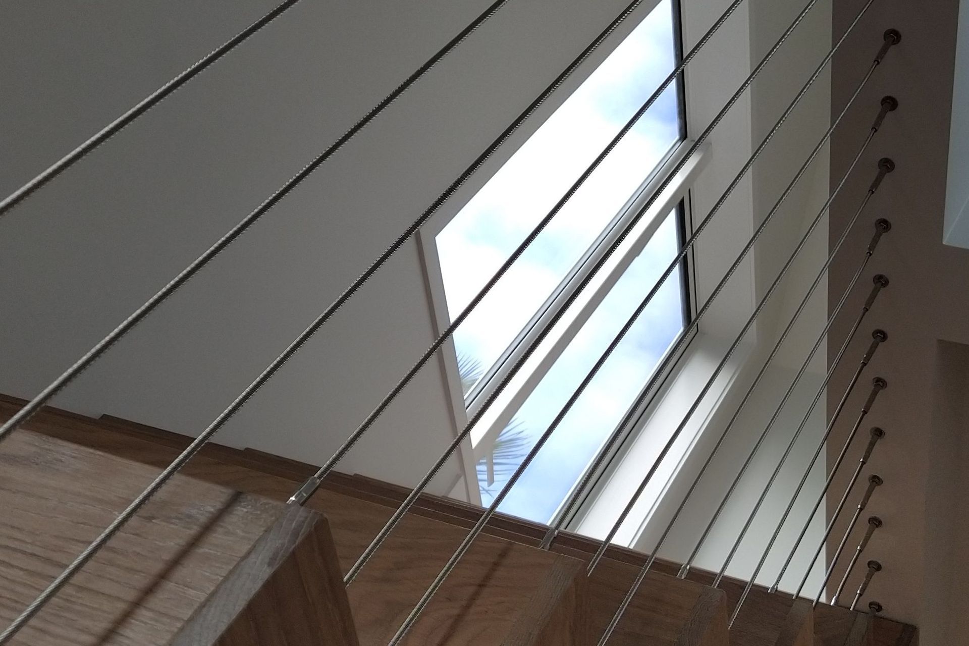 Floating stairs - residential wire balustrade infil