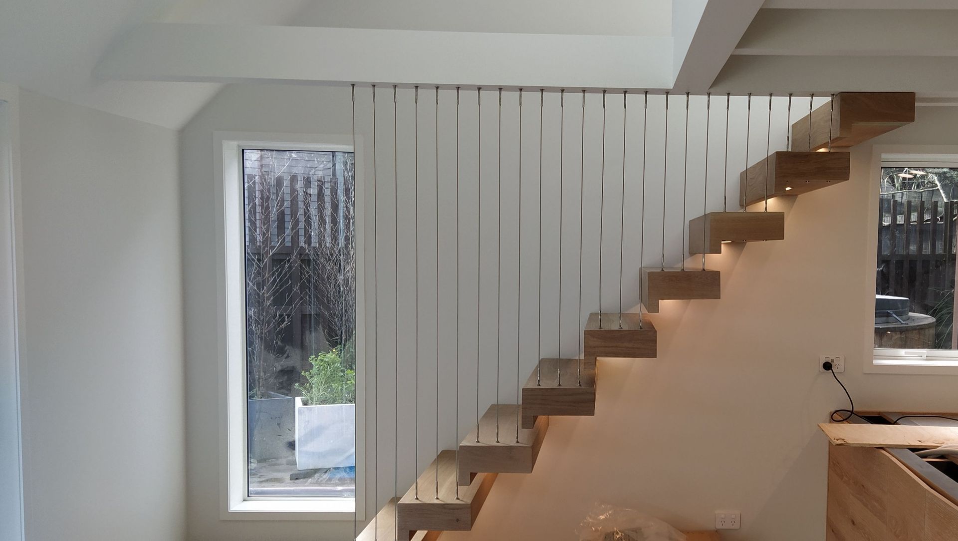 Floating stairs - residential wire balustrade infill banner