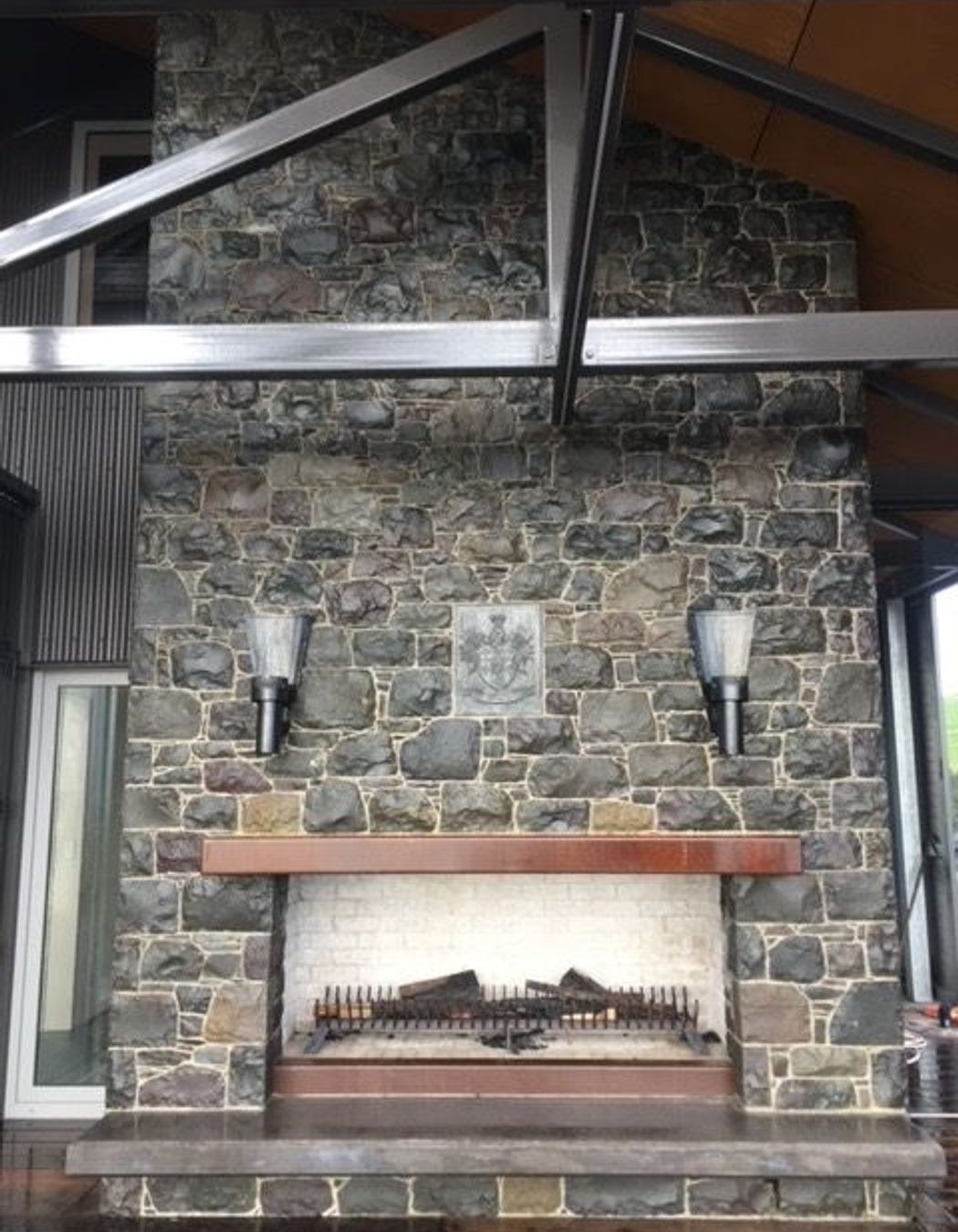 Katikati stone with carved stone coat of arms