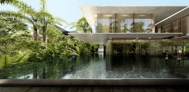 A contemporary multi-level residence with broad cantilevered concrete roof slabs, extensive floor-to-ceiling glazing, and a reflective infinity-edge pool integrated into a lush tropical garden. The architecture has crisp horizontal lines, pale textured concrete surfaces, and dark slender window frames, creating a resort-like indoor-outdoor connection.
