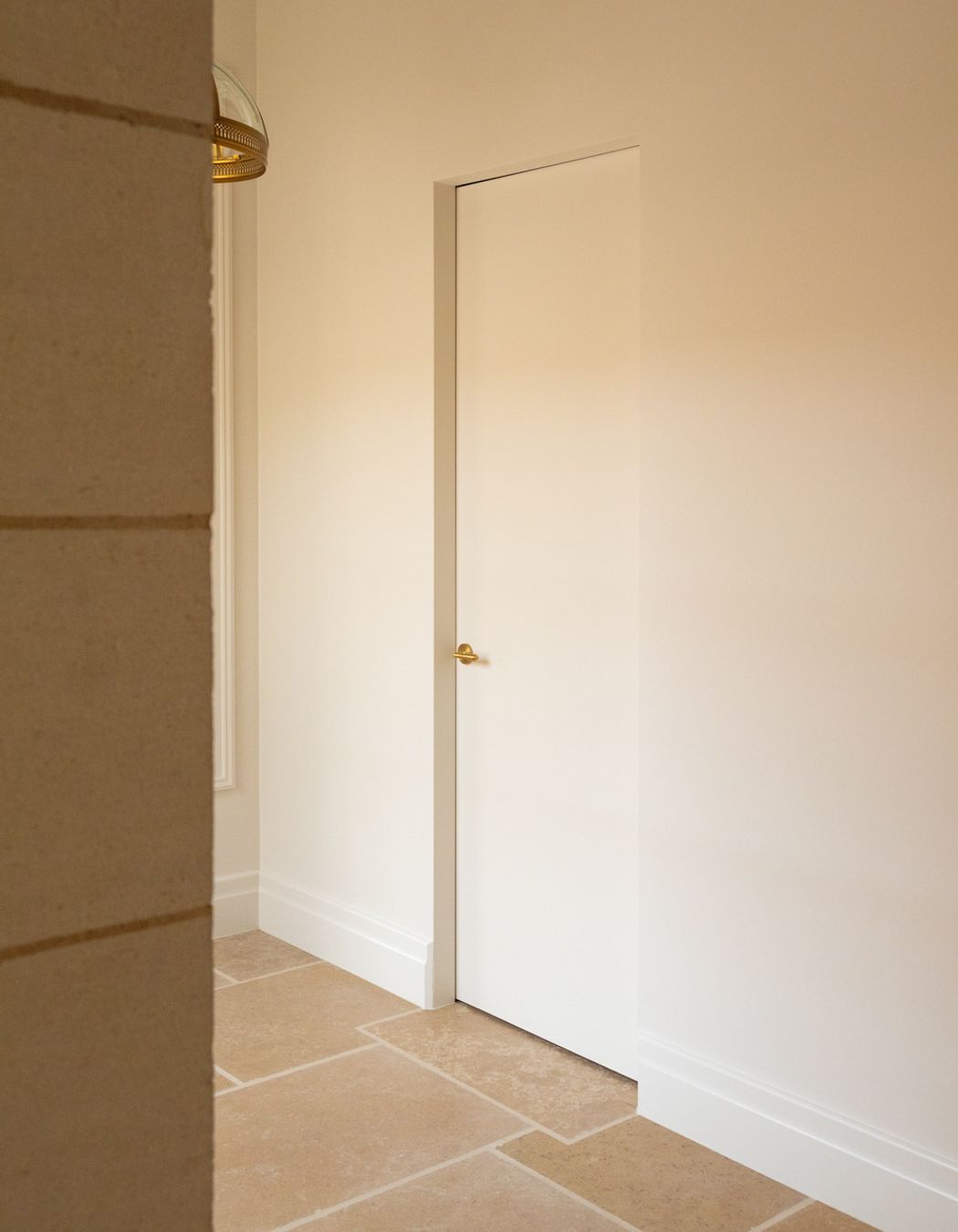 The SRC frame brings a clean line perimeter to this hallway opening that comfortably blends into its surroundings.