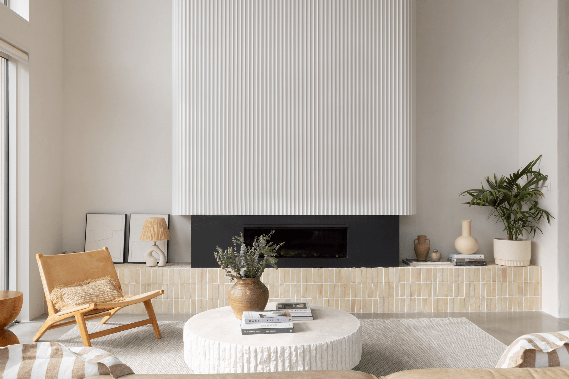 Genia mouldings incase the fireplace unit with DesignSource clay tiles