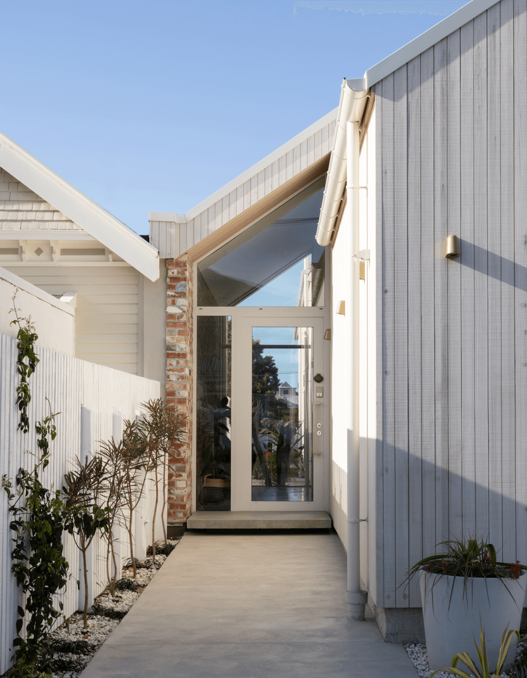 Entrance with recycled bricks from the old Duncan Building on High St joining the neighbours property