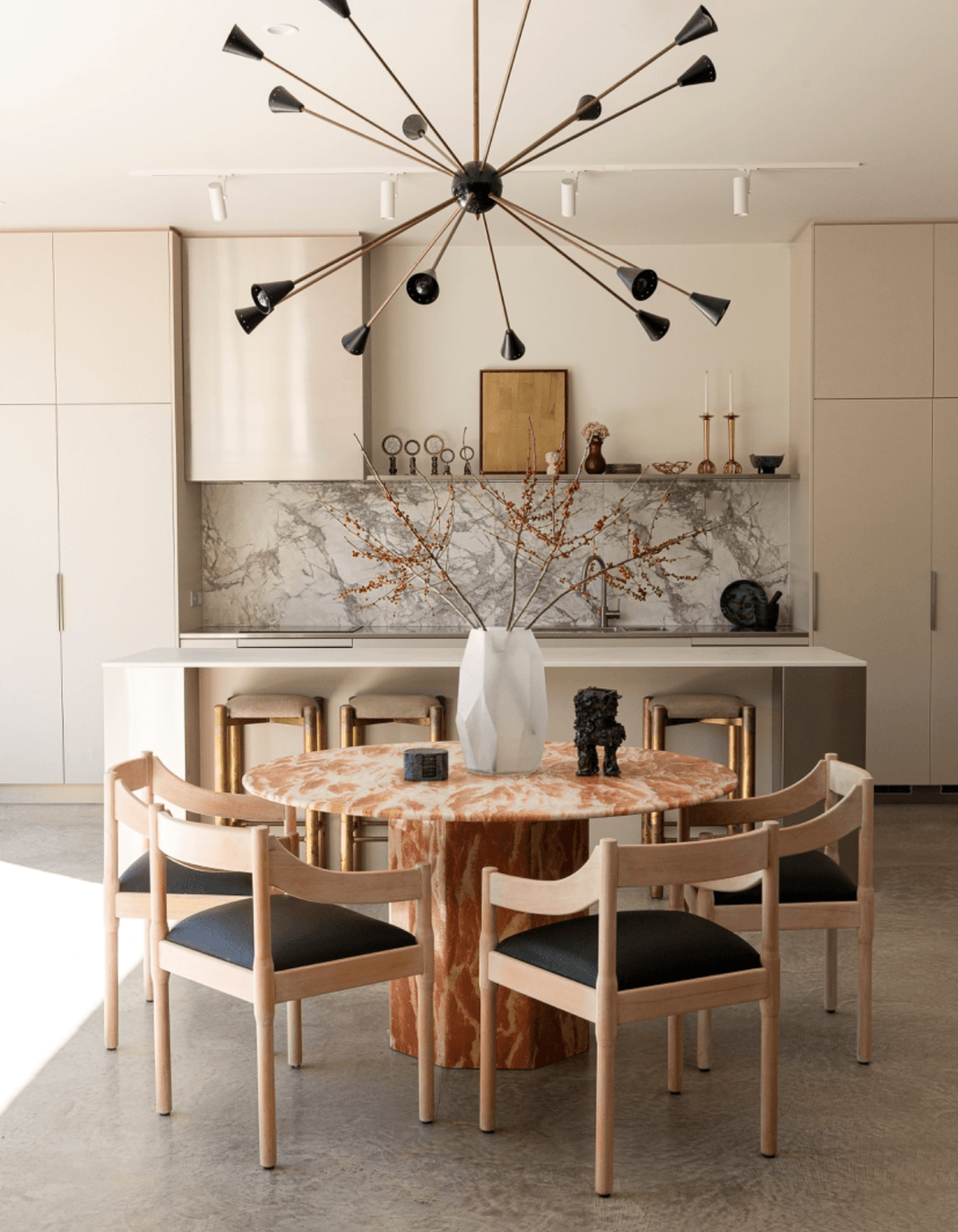 With an open floor plan and access to the courtyard, the kitchen and dining space is ideal for entertaining.