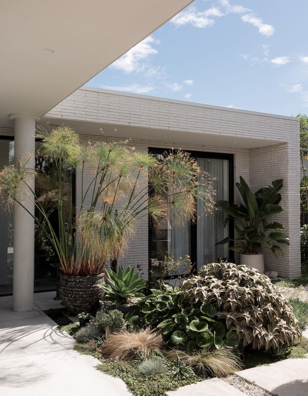 The media room sits at a right angle to the central living area.