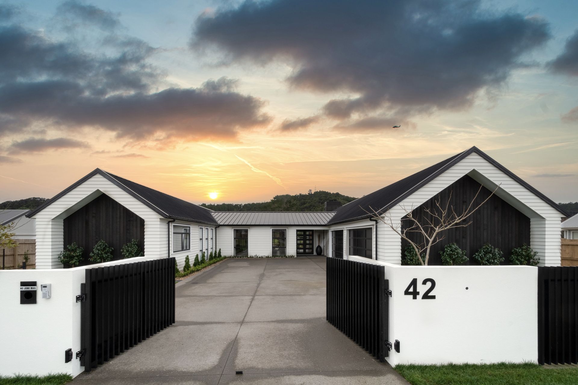 The homes sits within a spacious semi-rural lifestyle subdivision in Huapai.