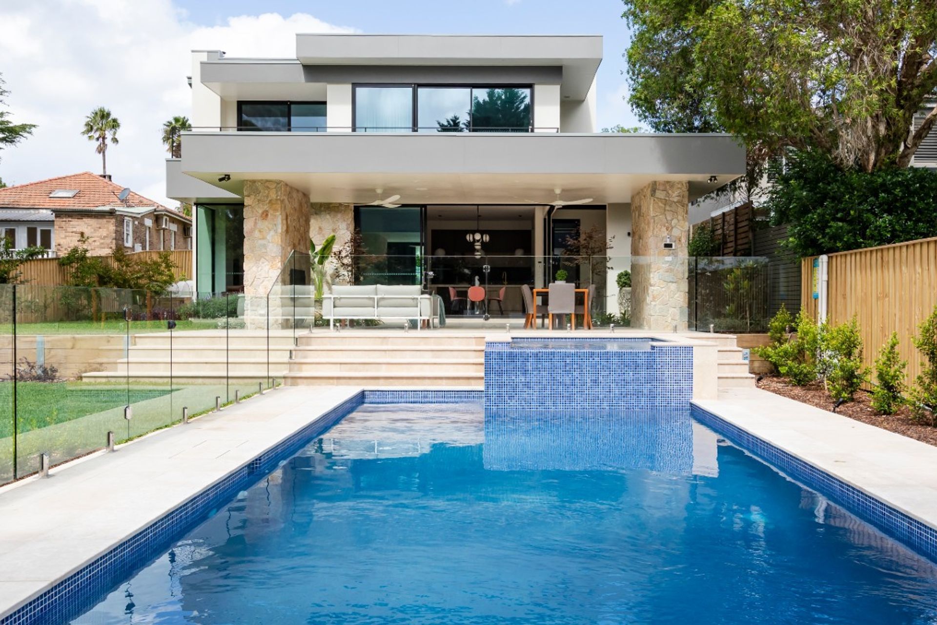 Lavarosa Limestone | Summit Wall Cladding | Chateau Architects + Builders | Crystal Pools | Green Coast Landscapers | Think Outside Gardens | One Four Interiors