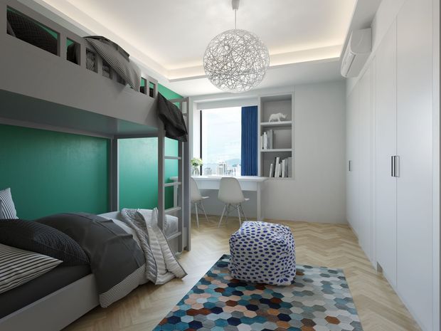 Bright, compact contemporary bedroom with a raised bunk or loft bed, vivid teal wall panels, integrated white wardrobe storage, a small built-in desk beneath the window, open shelving, and a geometric pendant light. The room has pale herringbone timber flooring, a multicoloured hexagonal rug, and coordinated blue and teal accents.