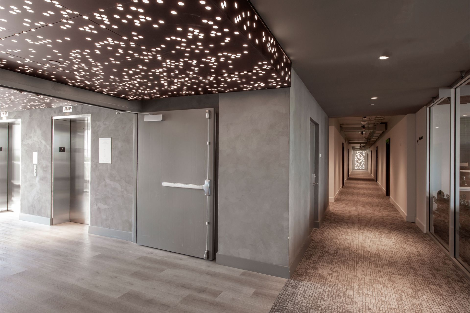 69545b87583b7c90eaf48b22Grove-Central-Interiors-Corridor-ap-compressed.jpg