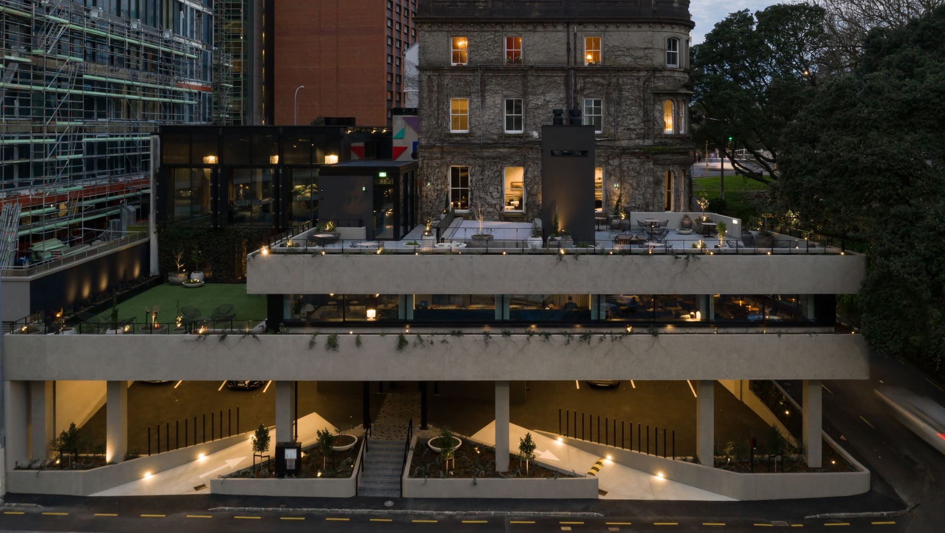 Northern Club Bankside Extension - balustrade, bollard and green facade  banner