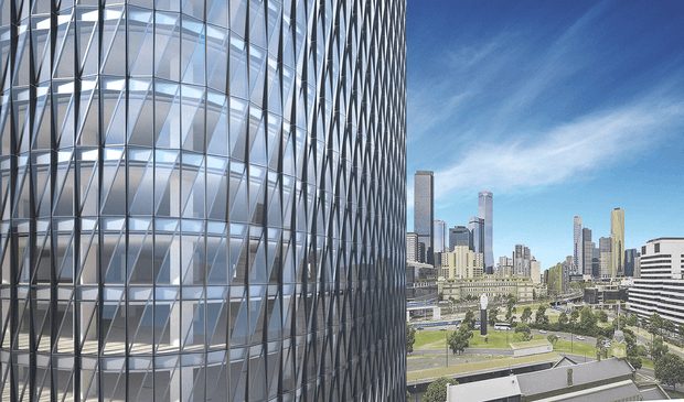 Exterior architectural view looking past a highly glazed high-rise building with a striking diagonal metal brise-soleil or structural facade grid toward a dense modern city skyline. The image shows curved and rectilinear glass curtain walling, reflective glazing, and an urban precinct with roads, landscaped open space, and neighboring towers under a clear blue sky.
