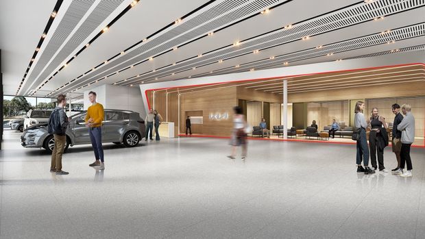 A wide, polished interior rendering of a contemporary commercial arrival or reception space. The large open hall has a ribbed linear ceiling with recessed lighting, a pale terrazzo-like floor, and a warm timber-clad reception or service volume outlined by a red accent line. People and vehicles are shown within the spacious lobby, with extensive glazing and an exterior street view visible at the left.