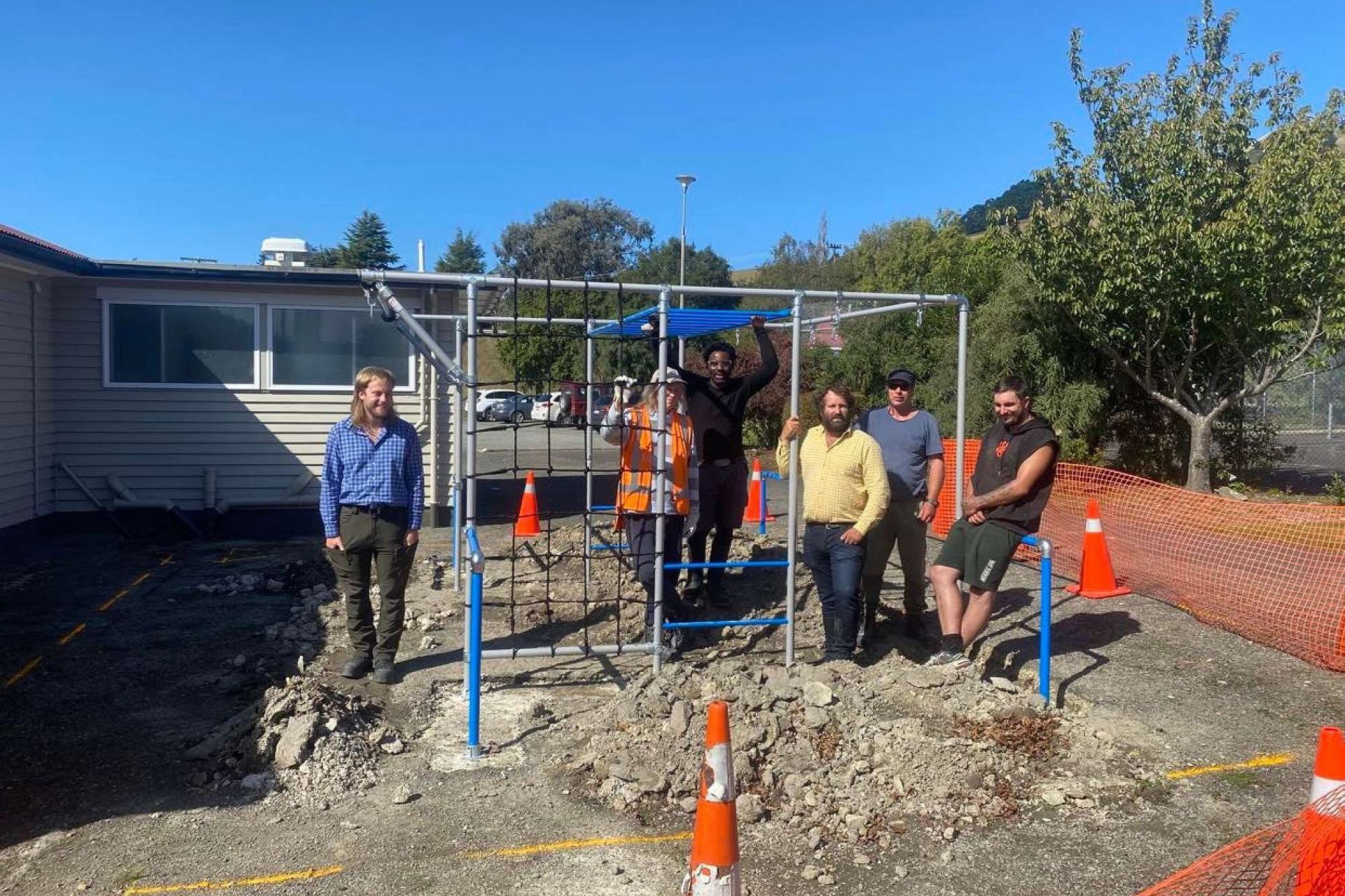 Photo of the JD Builders team: Regan (Quantity Surveyor), Jeff in the yellow shirt (CEO &amp; Master Builder), Elizabeth, Patrick, Phil &amp; Nick (Carpenters)