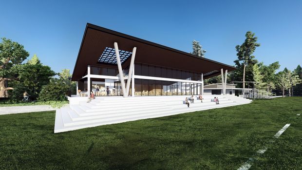 Architectural visualization of a contemporary pavilion-like building set within a landscaped grassy site. The structure has a dramatic single sloping roof with a dark soffit, extensive floor-to-ceiling glazing, white structural columns, broad stepped terraces, and a small glazed canopy or skylight feature. Trees and lawn surround the building, with people providing scale.