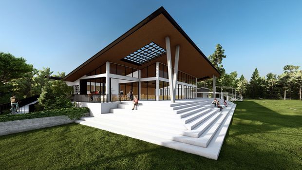 Architectural rendering of a large, elevated pavilion-like building set within landscaped grounds. The design features a broad pitched roof with deep eaves, extensive floor-to-ceiling glazing, slender white structural columns, an exposed roof terrace or pergola grid, and a wide series of white steps leading to an outdoor platform. The setting appears spacious and park-like, with mature trees and lawn surrounding the structure.