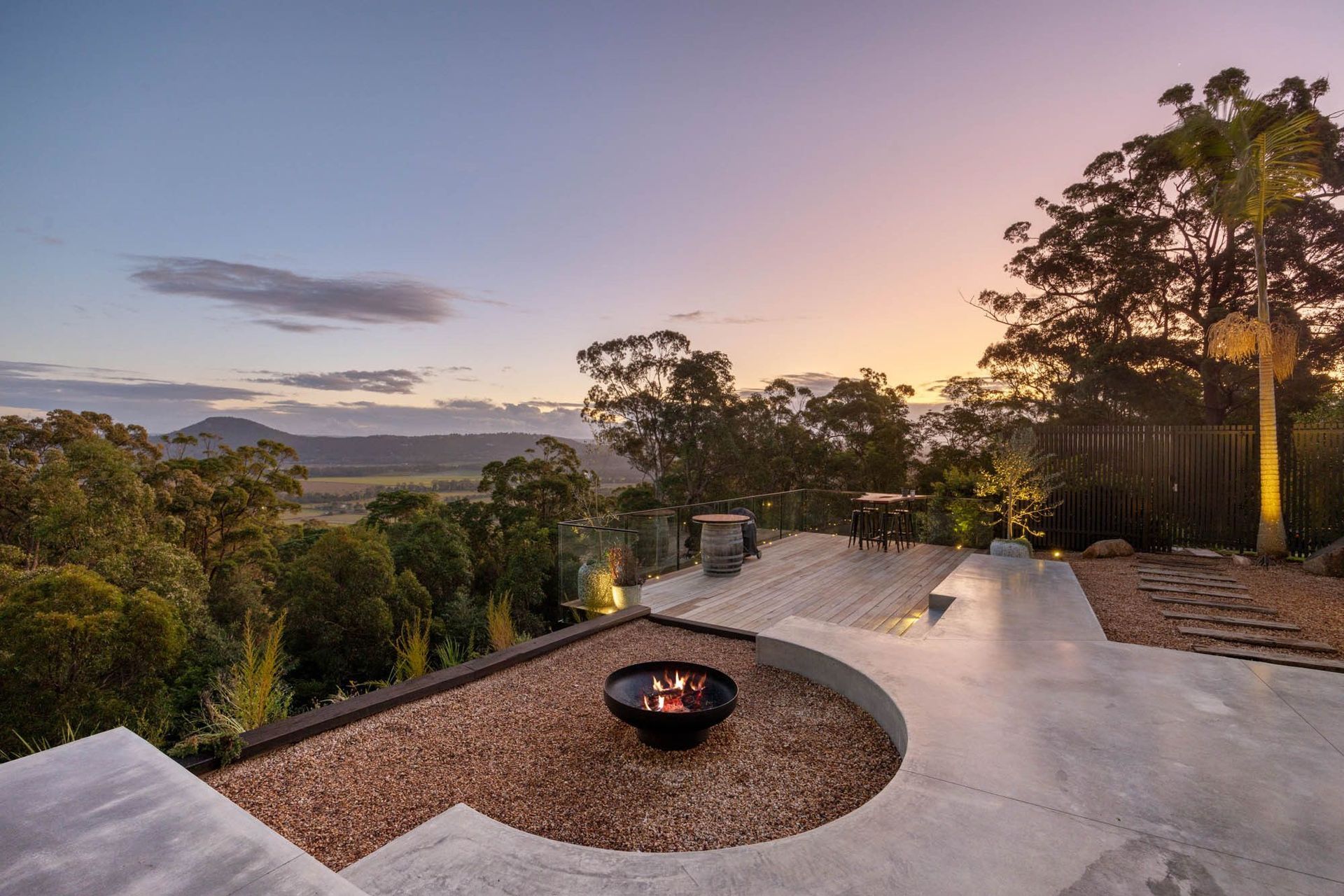 Seabrook and Borg Residence - Patio. Fire pit terrace overlooking the hinterland at sunset.