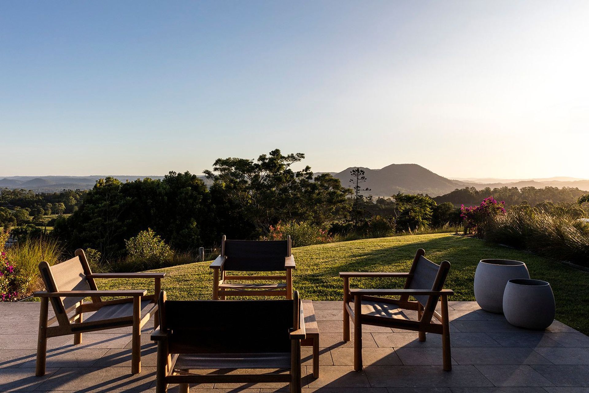 Clark Residence - Patio. Outdoor seating facing the sunset over the hills.